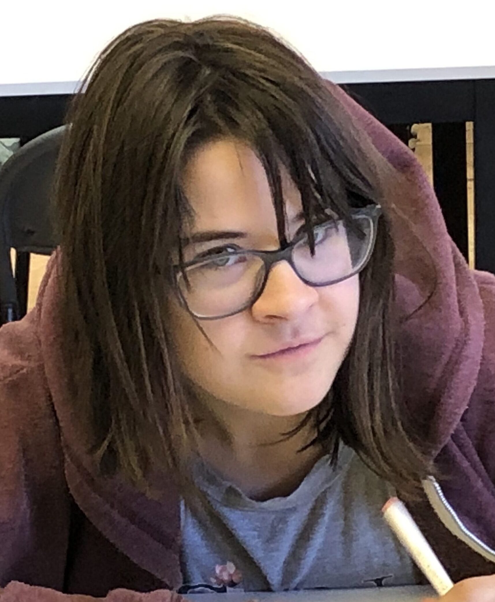 Jamie, beautiful young girl with shoulder-length brown hair and glassed
