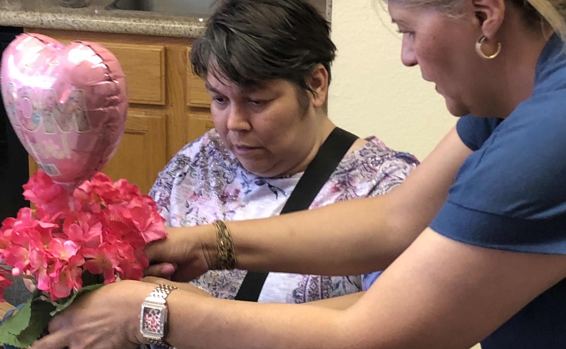 Baskets Made with Love Art Specialist, Sonia, helping Sonia create a wonderful Mother's Day Basket.